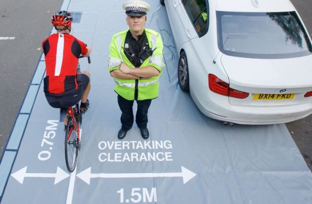 Police helping Cyclists